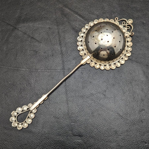 Vintage silver-plated tea strainer